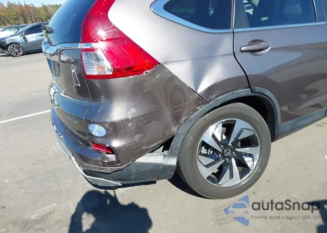 2016 Honda Cr-V Touring from USA, damaged, VIN 5J6RM3H97GL000595